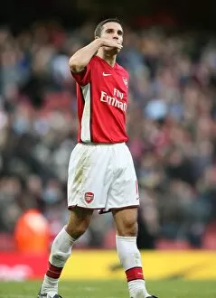 Images Dated 18th October 2008: Robin van Persie (Arsenal) blows a kiss to his family after the match