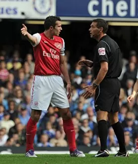 Images Dated 29th October 2011: Robin van Persie (Arsenal) chats with Referee Andre Marriner. Chelsea 3: 5 Arsenal