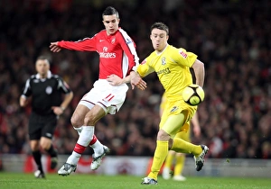Robin van Persie (Arsenal) Chris Burke (Cardiff)