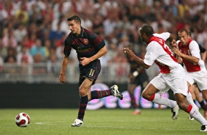 Ajax v Arsenal 2007-8 Gallery: Robin van Persie (Arsenal) Colin (Ajax)