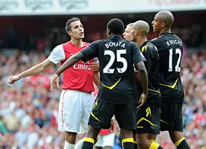 Arsenal v Bolton Wanderers 2011-12 Collection: Robin van Persie (Arsenal) Dedryck Boyata, Darren Pratley, Gretar Steinsson and Zat Knight (Bolton)