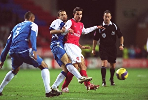 Wigan Athletic v Arsenal 2006-07 Gallery: Robin van Persie (Arsenal) Denny Landzaat (Wigan)