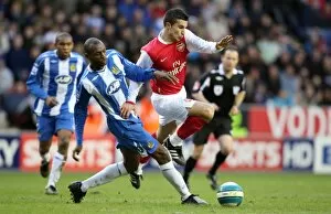 Images Dated 10th March 2008: Robin van Persie (Arsenal) Emmerson Boyce (Wigan)