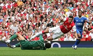 Images Dated 2nd September 2007: Robin van Persie (Arsenal) is fouled by David James (Portsmouth) for Arsenals penalty
