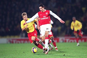 Watford v Arsenal Collection: Robin van Persie (Arsenal) Jay Demerit (Watford)