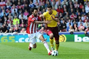 Images Dated 8th May 2011: Robin van Persie (Arsenal) Jermaine Pennant (Stoke). Stoke City 3: 1 Arsenal