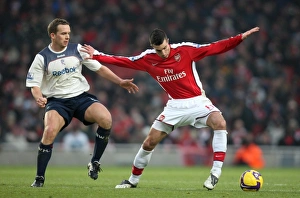 Arsenal v Bolton Wanderers 2008-09 Collection: Robin van Persie (Arsenal) Kevin Davies (Bolton)