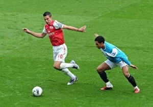Robin van Persie (Arsenal) Kieran Richardson (Sunderland). Arsenal 2: 1 Sunderland