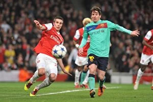 Images Dated 16th February 2011: Robin van Persie (Arsenal) Lionel Messi (Barcelona). Arsenal 2: 1 Barcelona