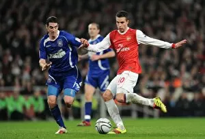 Images Dated 25th January 2011: Robin van Persie (Arsenal) Mark Kennedy (Ipswich). Arsenal 3: 0 Ipswich Town