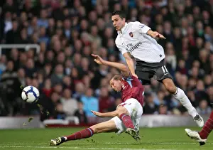 Robin van Persie (Arsenal) Matthew Upson (West Ham)