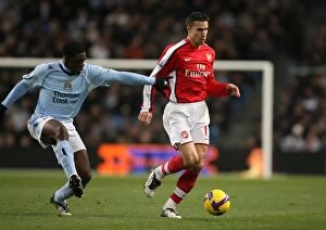 Manchester City v Arsenal 2008-09 Collection: Robin van Persie (Arsenal) Micah Richards (Man City)