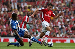 Arsenal V Wigan Athletic 2009-10 Prints: Robin van Persie (Arsenal) Mohamed Diame (Wigan)