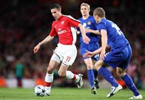 Arsenal v Manchester United - Champions League 2008-09 Collection: Robin van Persie (Arsenal) Nemanja Vidic (Man Utd)