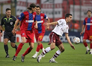 Steaua Bucharest v Arsenal 2007-08 Collection: Robin van Persie (Arsenal) Ovidiu Petre (Steaua)