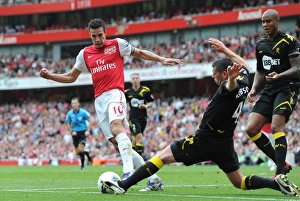 Arsenal v Bolton Wanderers 2011-12 Collection: Robin van Persie (Arsenal) Paul Robinson (Bolton). Arsenal 3: 0 Bolton Wanderers
