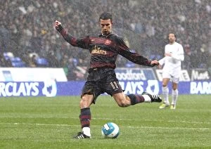 Images Dated 31st March 2008: Robin van Persie (Arsenal) in the rain