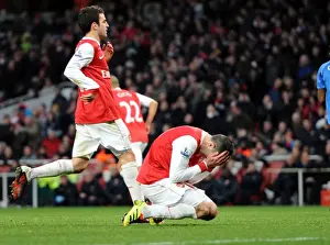 Robin van Persie (Arsenal) reacts to missing from the penalty spot. Arsenal 3