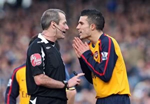 Images Dated 25th January 2009: Robin van Persie (Arsenal) and Referee Martin Atkinson
