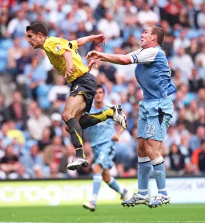Robin van Persie (Arsenal) Richard Dunne (Man City)