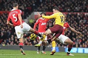 Images Dated 13th December 2010: Robin van Persie (Arsenal) Rio Ferdinand (Man United). Manchester United 1: 0 Arsenal