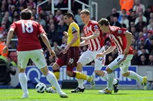 Stoke City V Arsenal 2010-11 Prints: Robin van Persie (Arsenal) Robert Huth and Ryan Shawcross (Stoke). Stoke City 3: 1 Arsenal