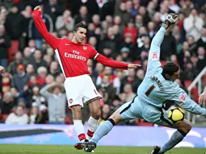 Robin van Persie (Arsenal) Roman Larrieu (Plymouth)