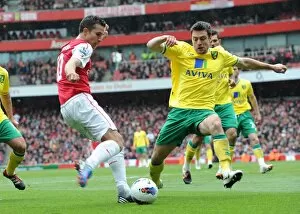 Images Dated 5th May 2012: Robin van Persie (Arsenal) Russel Martin (Norwich). Arsenal 3: 3 Norwich City