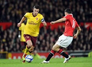 Manchester United v Arsenal FA Cup 2010-11 Collection: Robin van Persie (Arsenal) Ryan Giggs (Man Utd). Manchester United 2: 0 Arsenal
