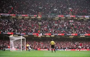 Images Dated 2nd December 2005: Robin van Persie (Arsenal) scores his penalty in the shoot out past Roy Carroll (Man Utd)