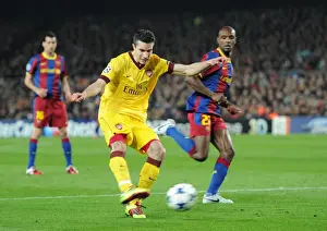 Robin van Persie (Arsenal) shoots for goal after the referee has blown his whistle earning a 2nd yellow card. Barcelona 3: 1 Arsenal. UEFA Champions League. Last 16, 2nd leg. Camp Nou, Barcelona, 8 / 3 / 11. Credit : Arsenal Football Club /