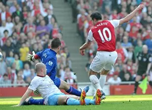Robin van Persie (Arsenal) shoots past Shay Given and Alan Hutton (Villa)