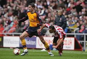 Robin van Persie (Arsenal) Steet Malbranque (Sunderland)