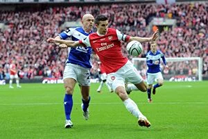 Images Dated 27th February 2011: Robin van Persie (Arsenal) Stephen Carr (Birmingham). Arsenal 1: 2 Birmingham City