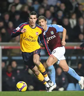 Robin van Persie (Arsenal) Stiliyan Petrov (Aston Villa)
