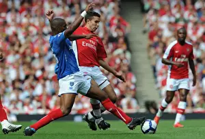 Arsenal V Portsmouth 2009-10 Prints: Robin van Persie (Arsenal) Sylvain Distin (Portsmouth)