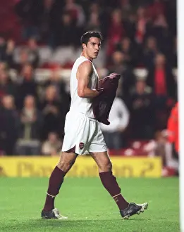 Robin van Persie (Arsenal) takes of his shirt to throw it into the crowd