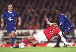 Images Dated 3rd December 2005: Robin van Persie (Arsenal) Yoseph Yobo (Everton). Arsenal 3: 1 Everton