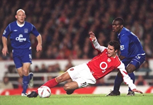 Images Dated 3rd December 2005: Robin van Persie (Arsenal) Yoseph Yobo (Everton). Arsenal 3: 1 Everton