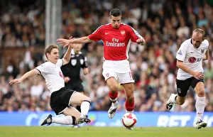 Robin van Persie (Arsenal) Zoltan Gera and Danny Murphy (Fulham)