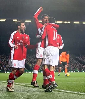 Robin van Persie celebrates scoring the 1st Arsenal