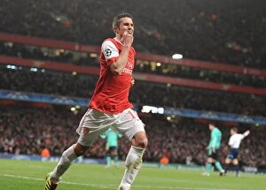 Images Dated 16th February 2011: Robin van Persie celebrates scoring the 1st Arsenal goal. Arsenal 2: 1 Barcelona