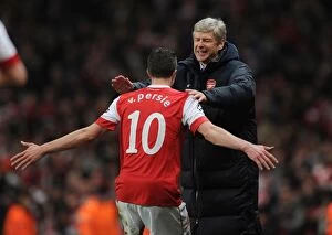 Images Dated 16th February 2011: Robin van Persie celebrates scoring the 1st Arsenal goal with manager Arsene Wenger