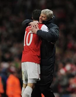 Images Dated 16th February 2011: Robin van Persie celebrates scoring the 1st Arsenal goal with manager Arsene Wenger