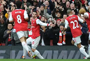 Robin van Persie celebrates scoring the 1st Arsenal goal with Gael Clichy and Samir Nasri