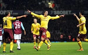 West Ham United v Arsenal 2010-11 Collection: Robin van Persie celebrates scoring his 1st goal with Theo Walcott and Samir Nasri