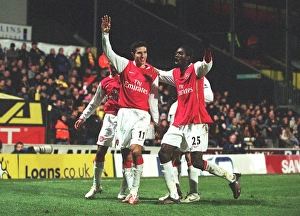 Watford v Arsenal Collection: Robin van Persie celebrates scoring the 2nd Arsenal goal with Emmanuel Adebayor