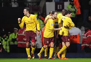 West Ham United v Arsenal 2010-11 Collection: Robin van Persie celebrates scoring his 2nd goal Arsenals 3rd with his team mates