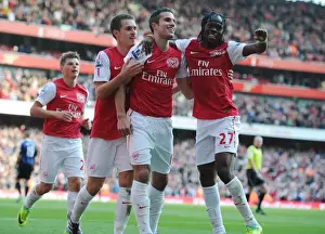 Robin van Persie celebrates scoring his 2nd goal Arsenals 3rd with Aaron Ramsey and Gervinho
