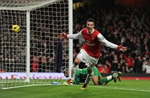 Robin van Persie celebrates scoring the 3rd Arsenal goal. Arsenal 3: 0 Wigan Athletic